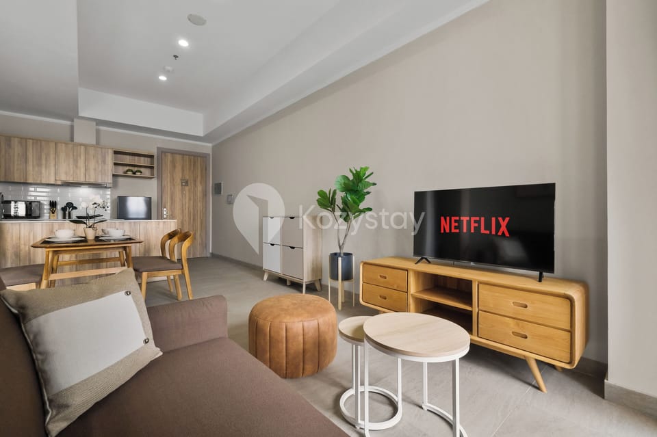 Apartment, 2 Bedrooms, City View | Living area | 43-inch Smart TV with cable channels, Netflix, streaming services