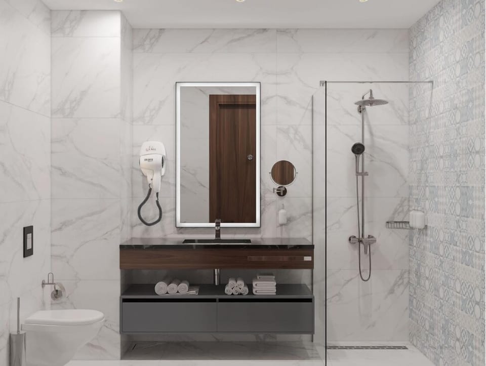 Shower, hair dryer, slippers, towels