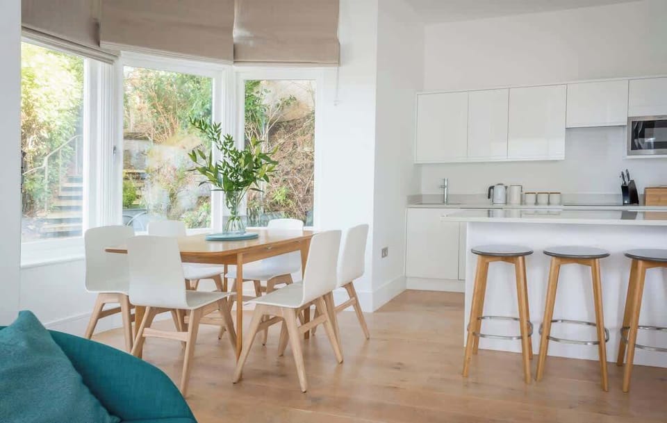Eat together in the sun lit dining area 