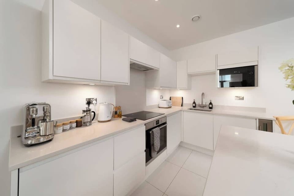 The bright, modern kitchen comes fully equipped with everything you need for throughout your stay.