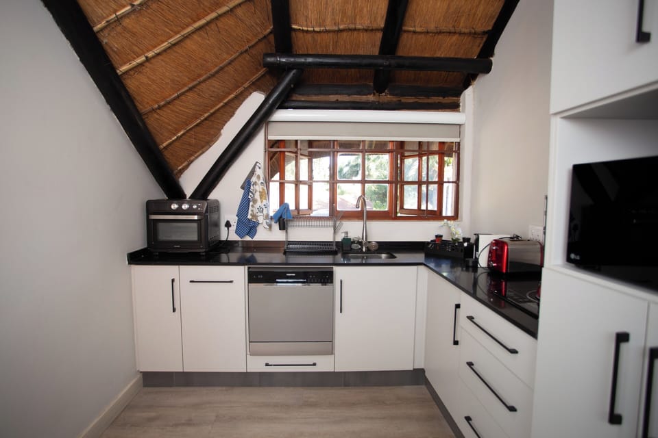 Luxury Studio Suite, Balcony, Pool View | Private kitchen | Full-size fridge, microwave, oven, stovetop