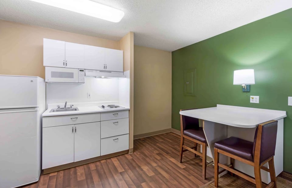 Studio, 1 King Bed, Non Smoking | Private kitchen | Full-size fridge, microwave, stovetop, coffee/tea maker