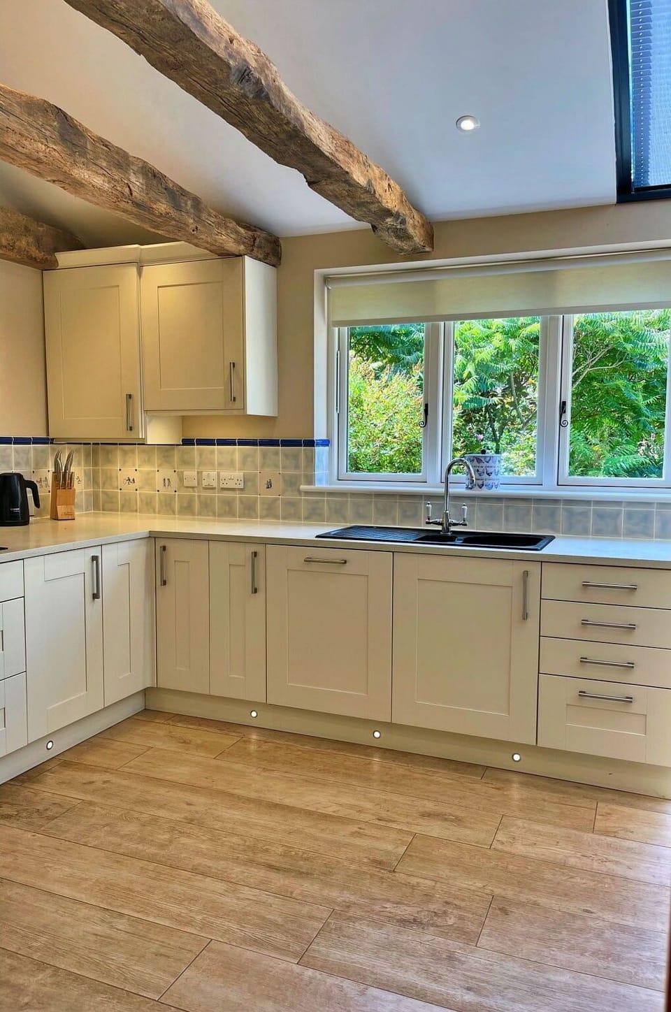 Flooring, Countertop, Interior Design, Kitchen, Furniture, Floor, Wood, Kitchen Appliance, Cabinetry, Ceiling