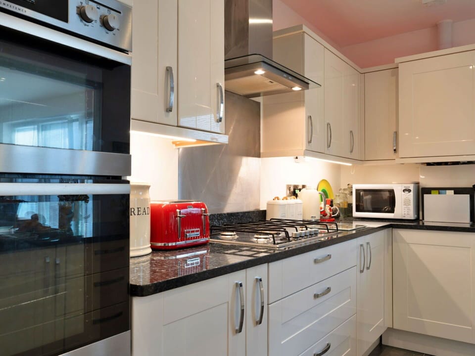 Kitchen, Kitchen Appliance, Countertop, Major Appliance, Cabinetry, Home Appliance, Interior Design, Kitchen Stove, Stove, Flooring