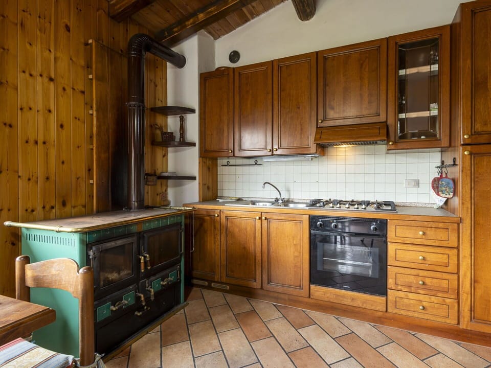 Wood, Kitchen, Interior Design, Flooring, Cabinetry, Countertop, Ceiling, Floor, Furniture, Room