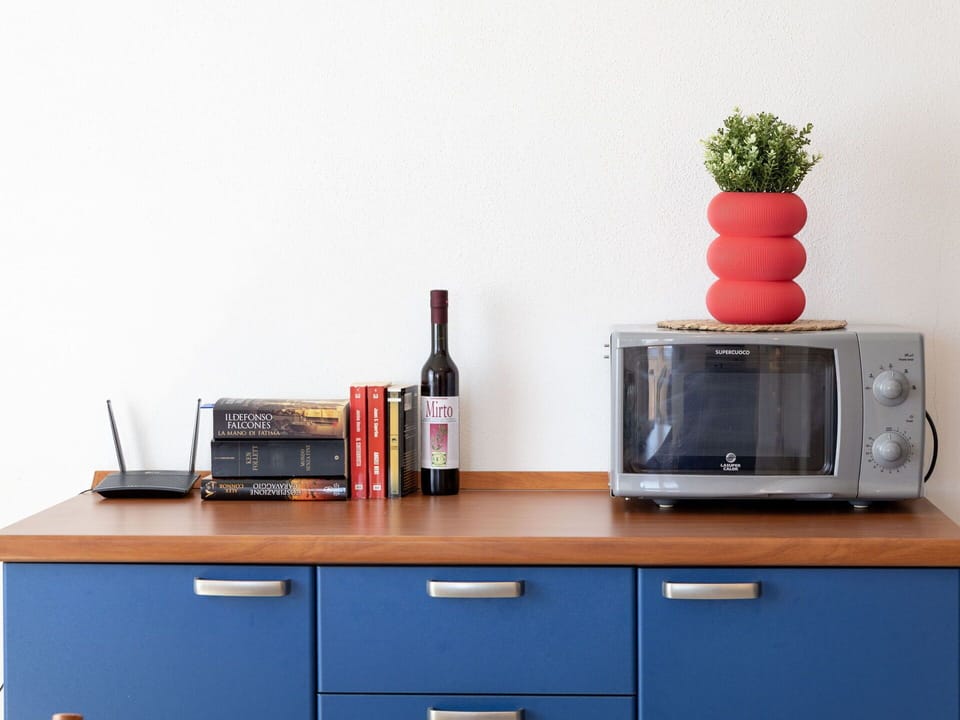 Cabinetry, Fruit, Drawer, Kitchen, Countertop, Kitchen Appliance, Wood Stain, Natural Foods, Houseplant