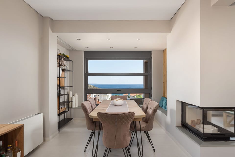 Luxury Villa, Sea View | Living area | 50-inch Smart TV with digital channels, fireplace