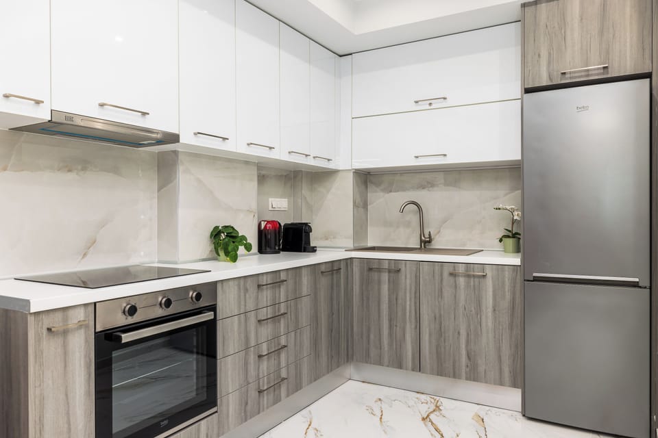 Apartment, Balcony, City View | Private kitchen | Espresso maker, electric kettle, toaster