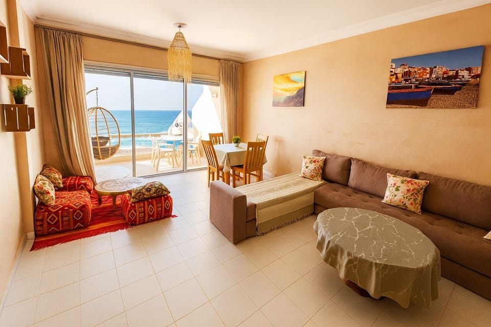 Spacious living room with sliding doors with moroccan seatings and dining area