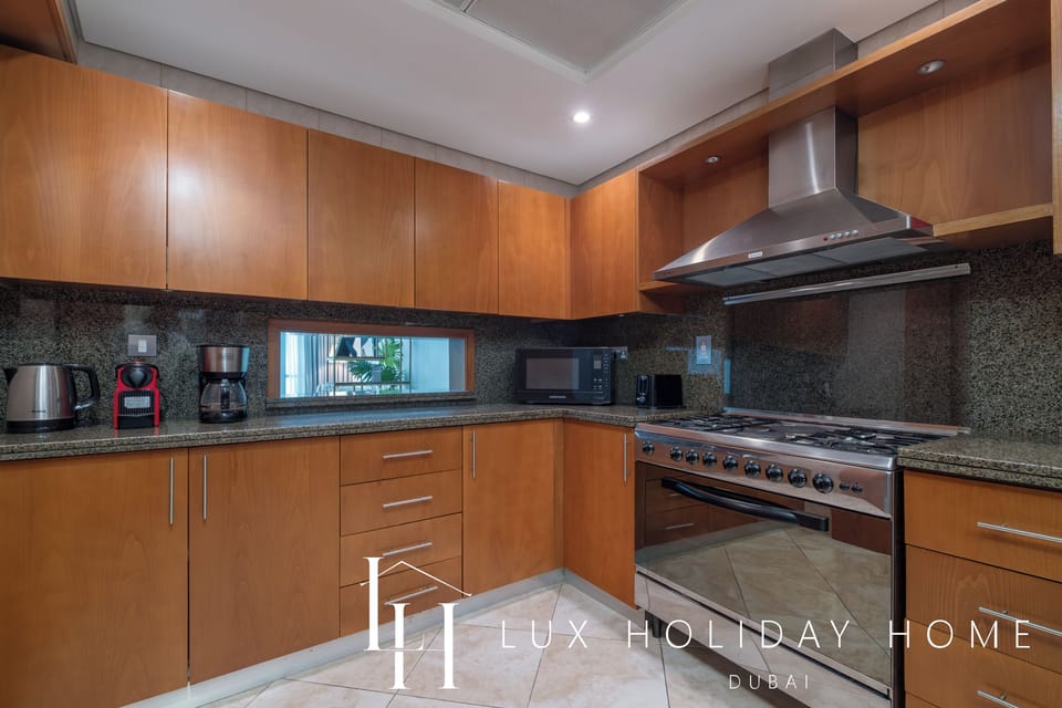 Apartment, Partial Sea View | Private kitchen | Electric kettle, toaster