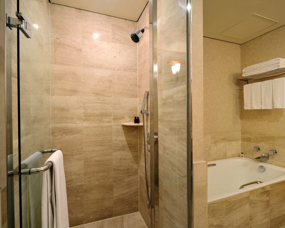 Premier Quadruple Room | Bathroom | Combined shower/tub, deep soaking tub, free toiletries, hair dryer
