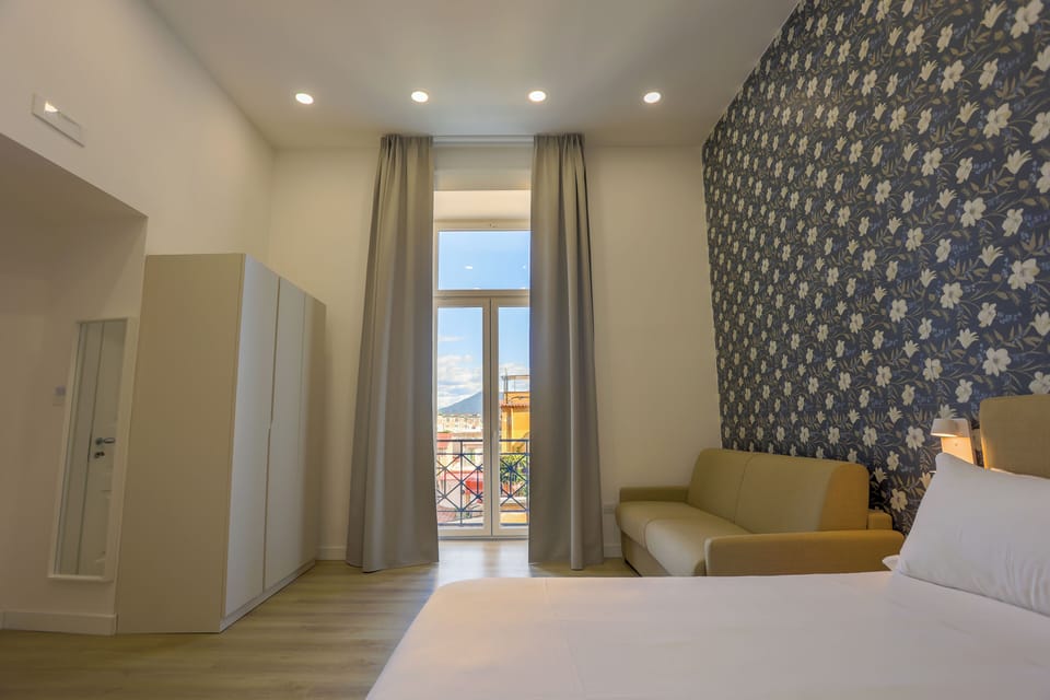 Superior Room, Balcony, City View | In-room safe, desk, laptop workspace, blackout drapes