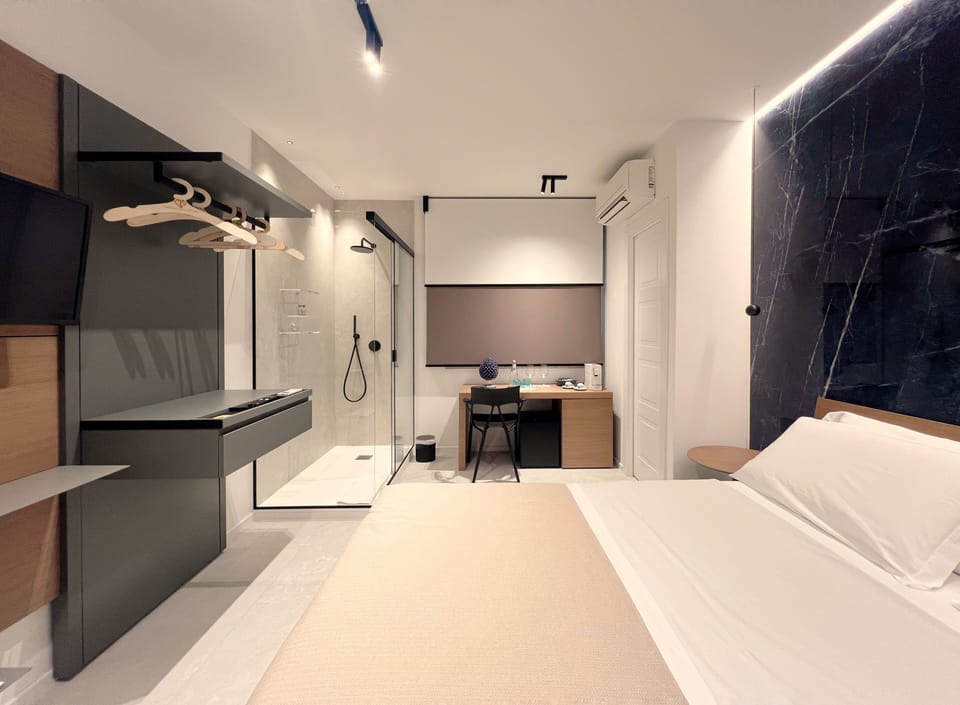 Junior Suite, Balcony | Minibar, desk, laptop workspace, soundproofing