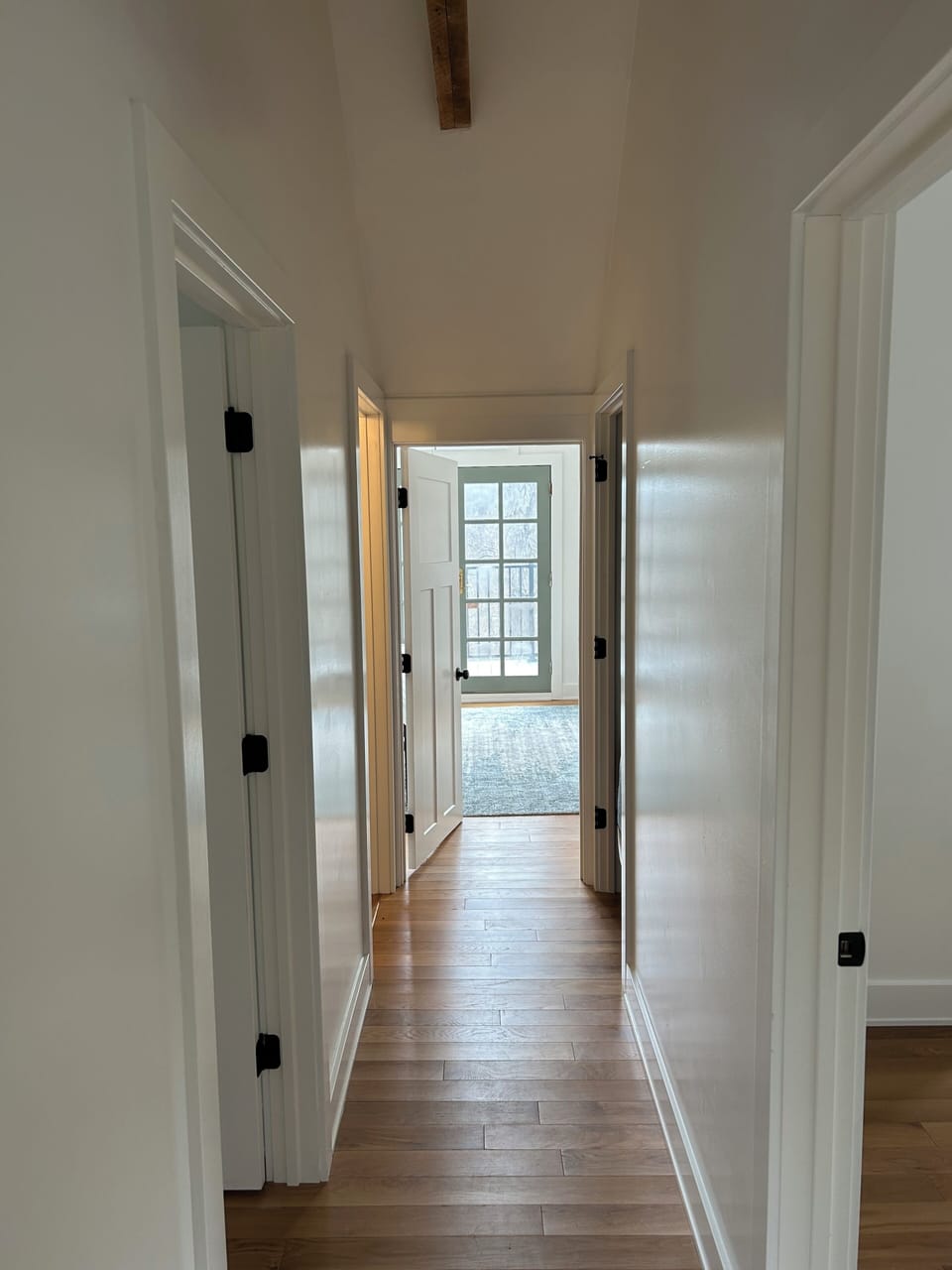 Hallway to the 3 bedrooms located upstairs. 