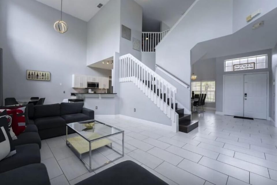 House | Living area | 75-inch Smart TV with digital channels, foosball, streaming services