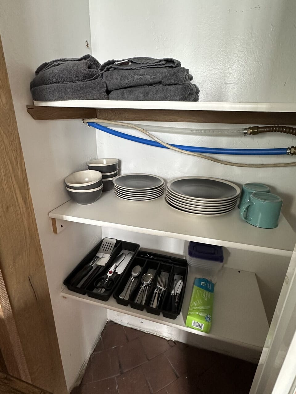 Dishes & utensils in Bathhouse closet