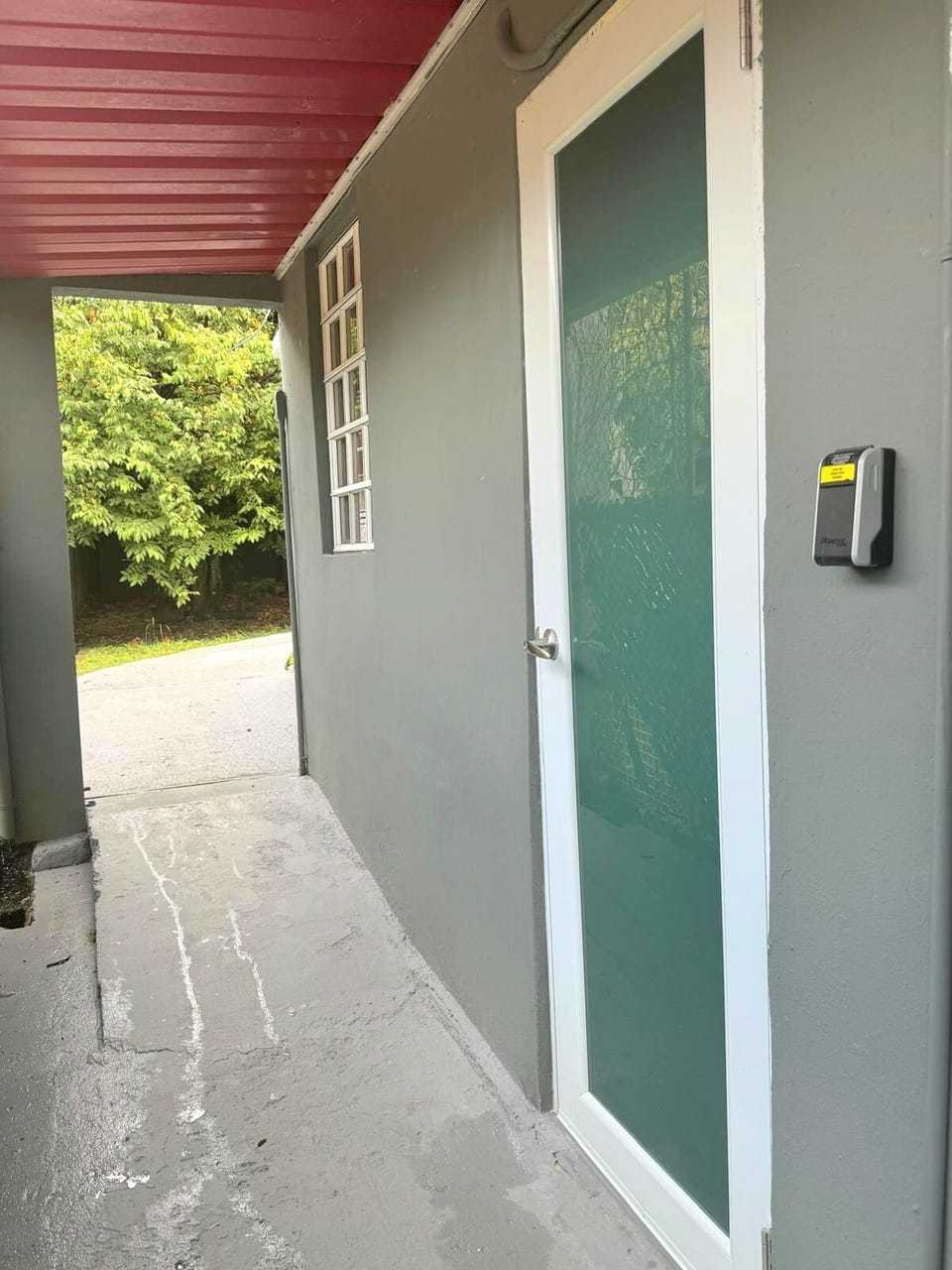 Glass door is the entrance for Studio 1. It's labeled "Las Lomas studio 1".
