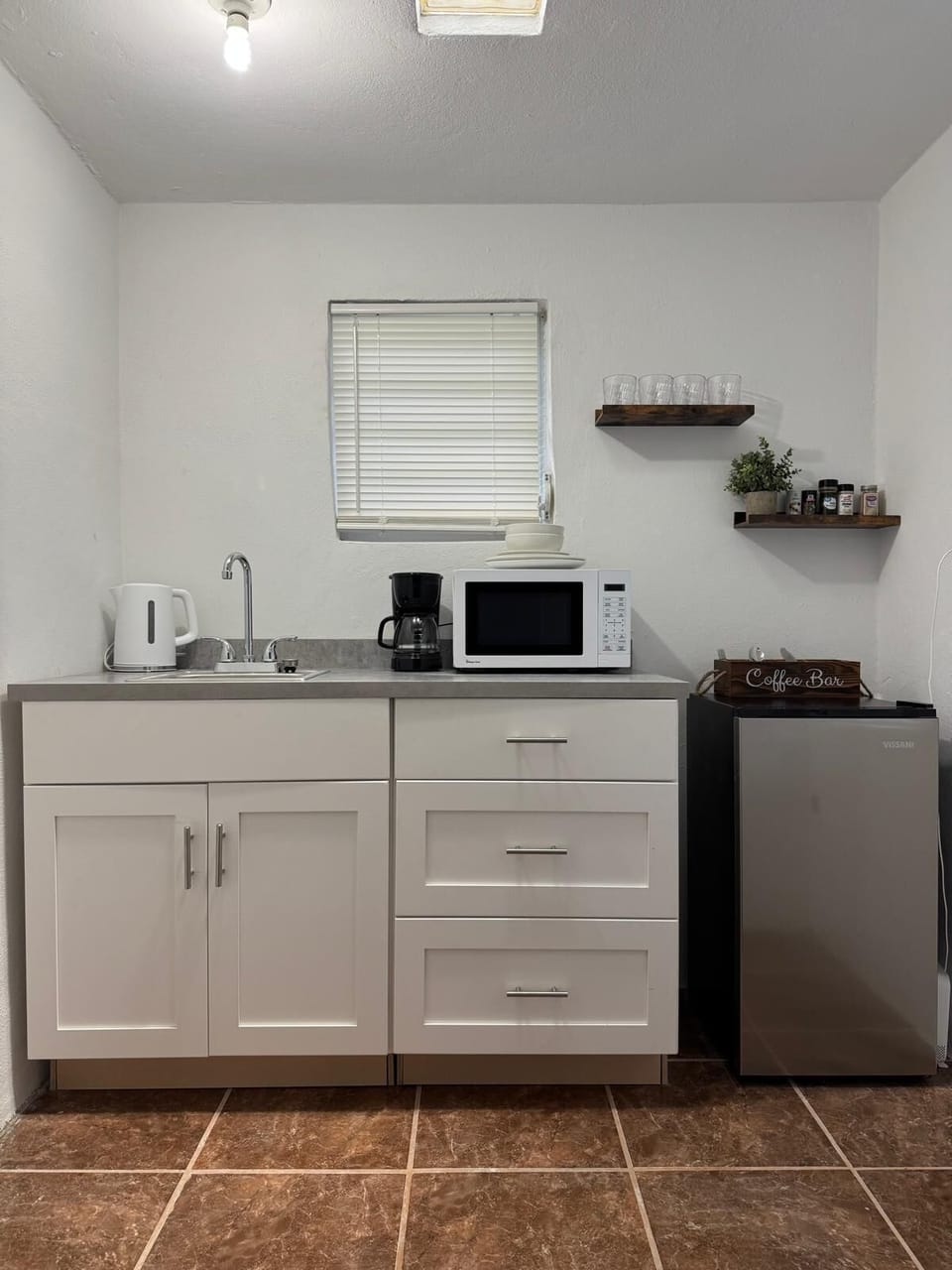 Kitchenette has Microwave, coffeemaker, tea kettle and an electric griddle.