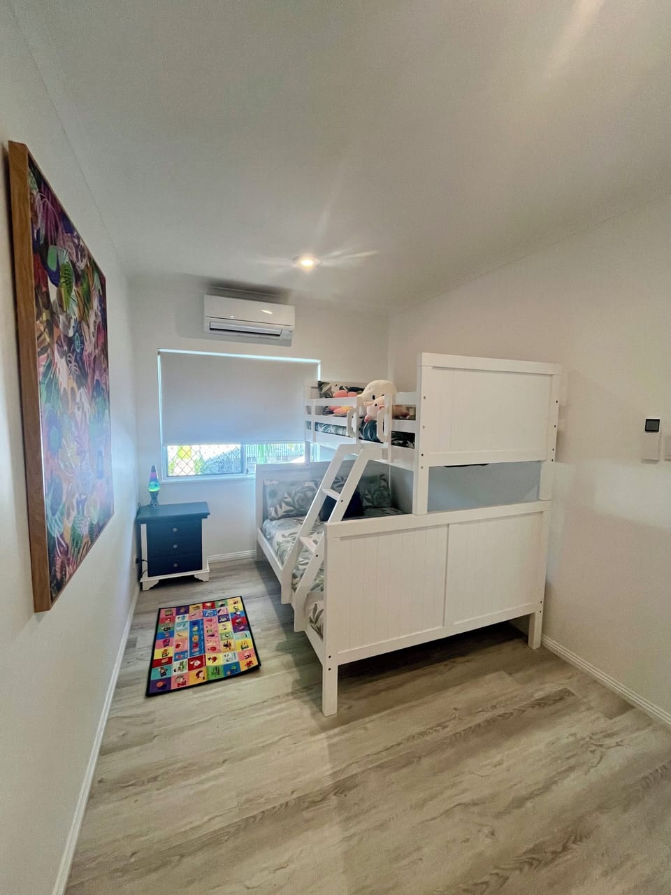 2nd bedroom, double and single bed, wardrobe, drawers, aircon, play tent & toys