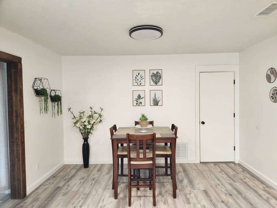Hallway bathroom with shower, vanity, and modern lighting