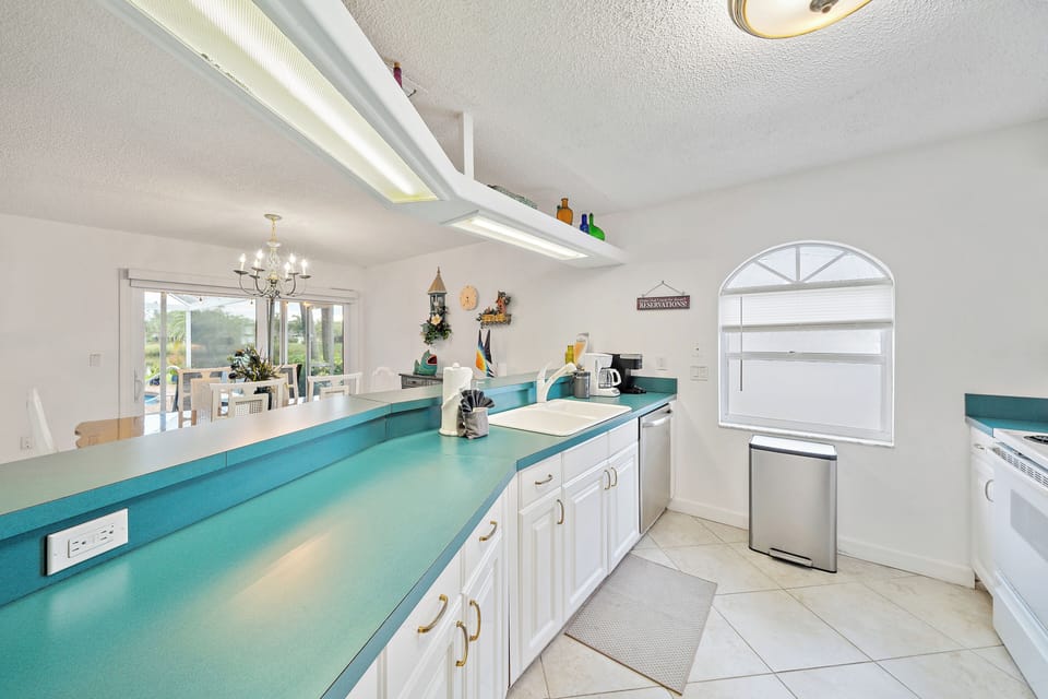 This open concept kitchen ensures no one will miss out on the fun.