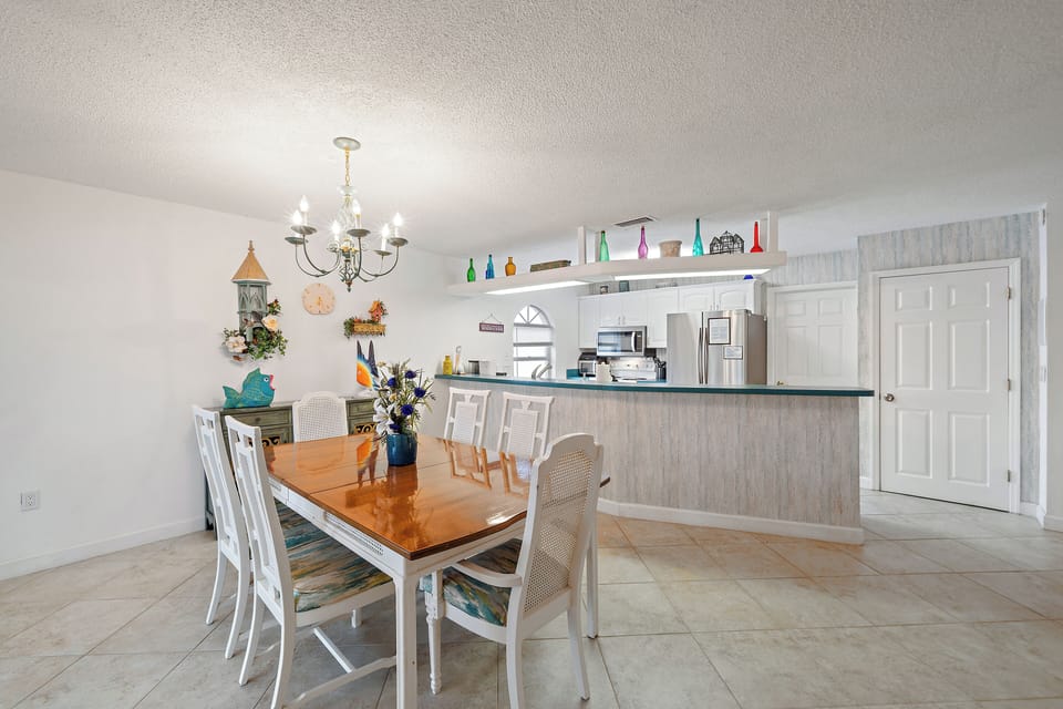 This open concept home ensures no one will miss out on the fun.