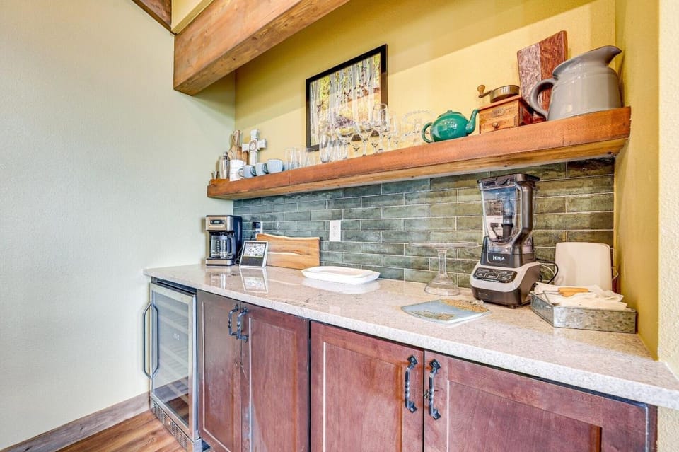 Coffee bar with wine fridge and blender 