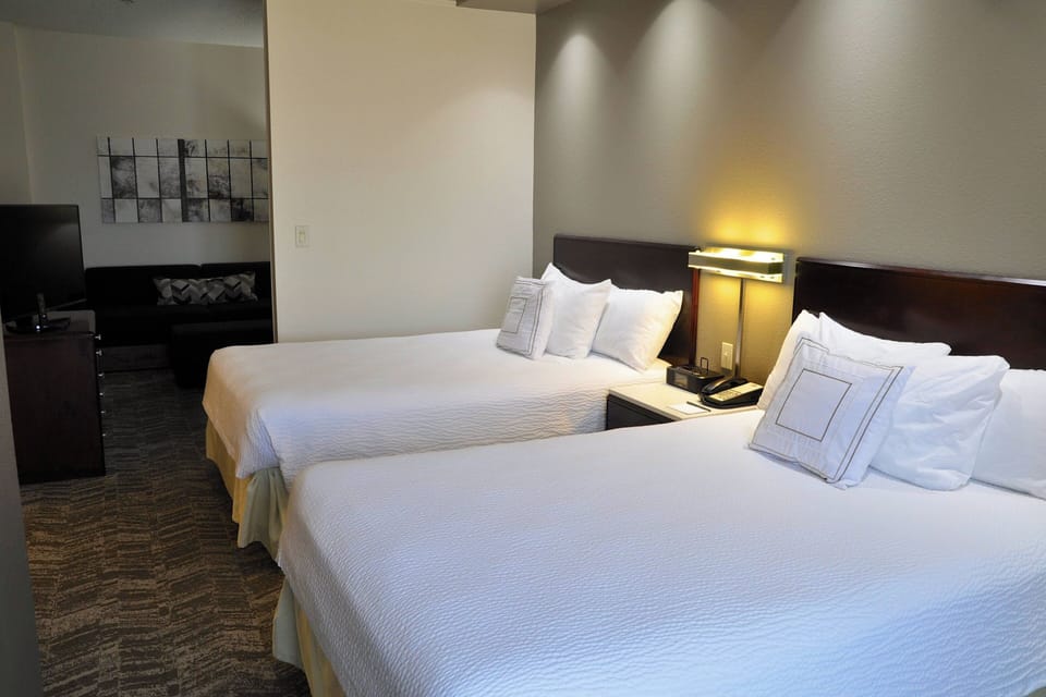 Premium bedding, down comforters, pillowtop beds, desk