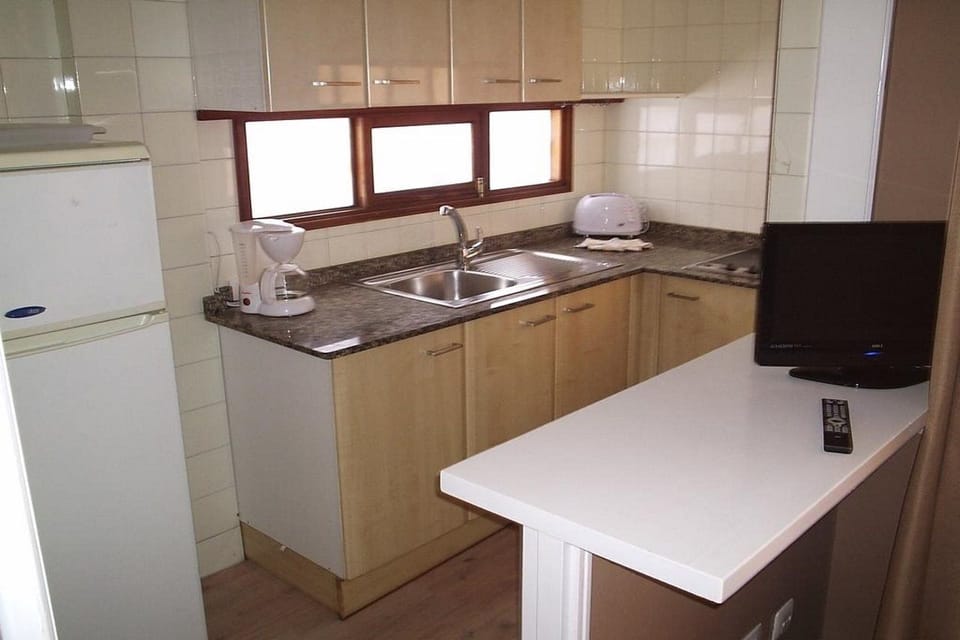 Fridge, microwave, electric kettle, toaster