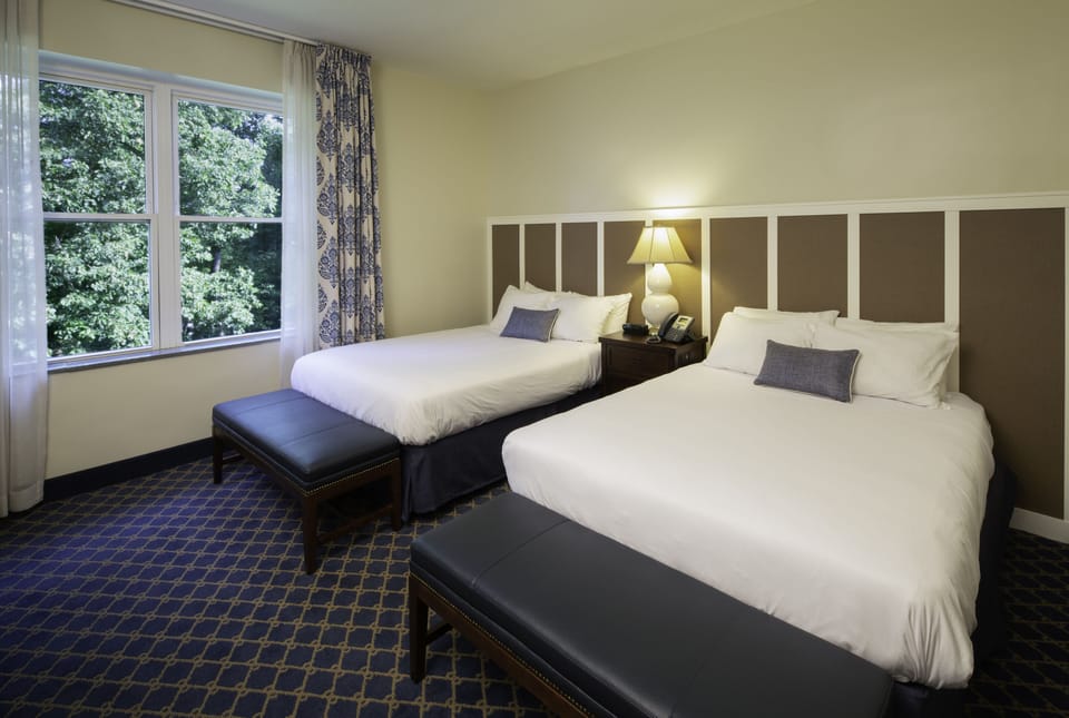 Economy Room, 2 Queen Beds | In-room safe, soundproofing, free WiFi, bed sheets