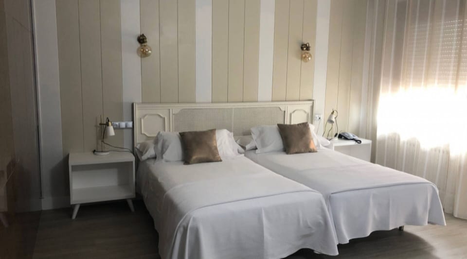 Desk, soundproofing, iron/ironing board, rollaway beds