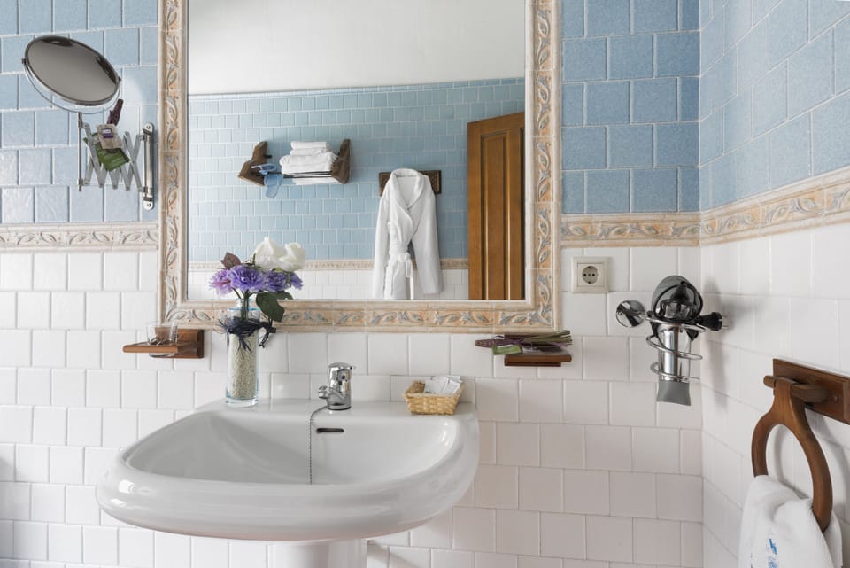 Hair dryer, heated floors, towels, soap