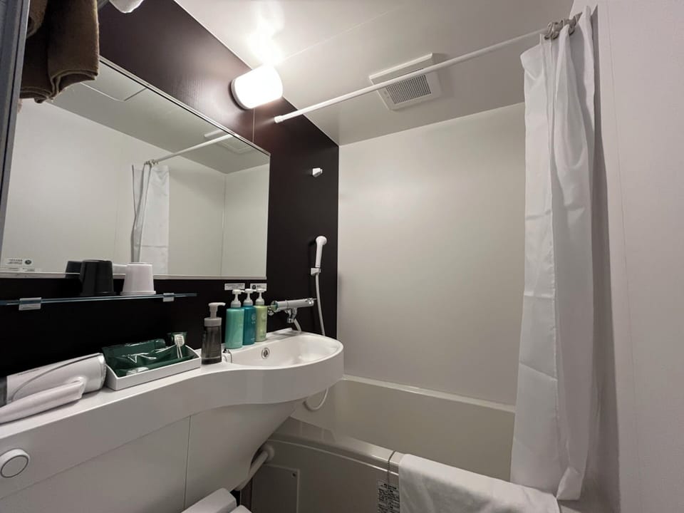 Twin Room, Non Smoking | Desk, laptop workspace, blackout drapes, iron/ironing board (on request)