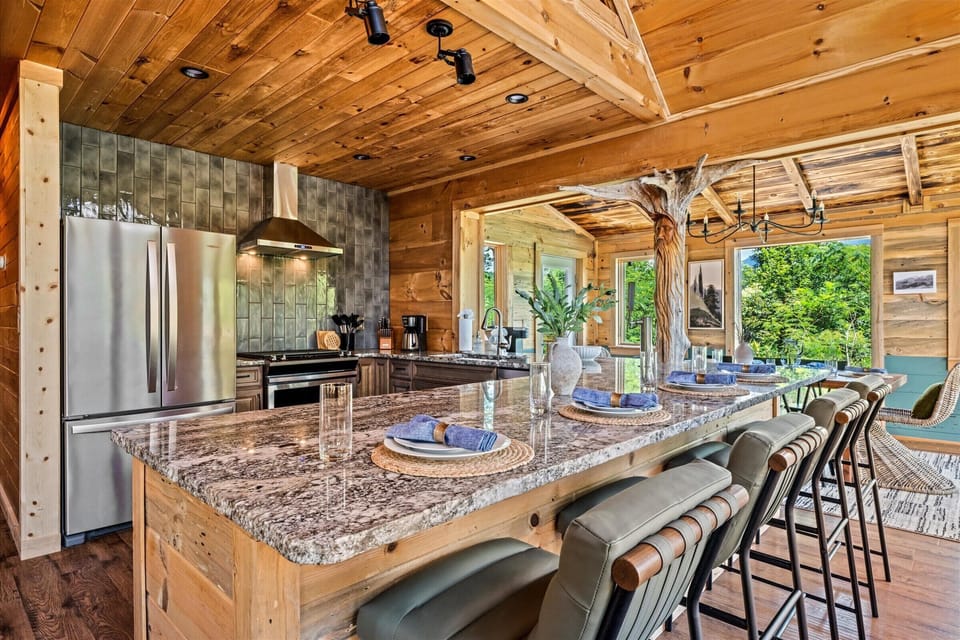 This kitchen isn’t just beautiful—it’s packed with everything you need to feel right at home, including premium appliances and a generous island with high seating for your whole crew. 