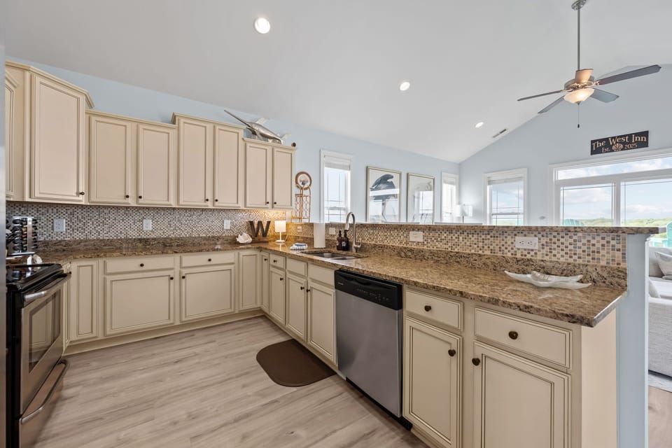 Beautiful granite spans the entire kitchen, providing ample space for the whole group to pitch in on dinner- never too many cooks in this kitchen! 
