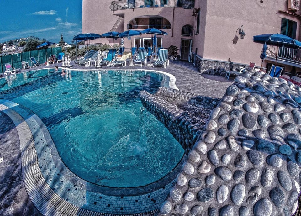 Indoor pool, outdoor pool, open 8:00 AM to 7:30 PM, pool umbrellas