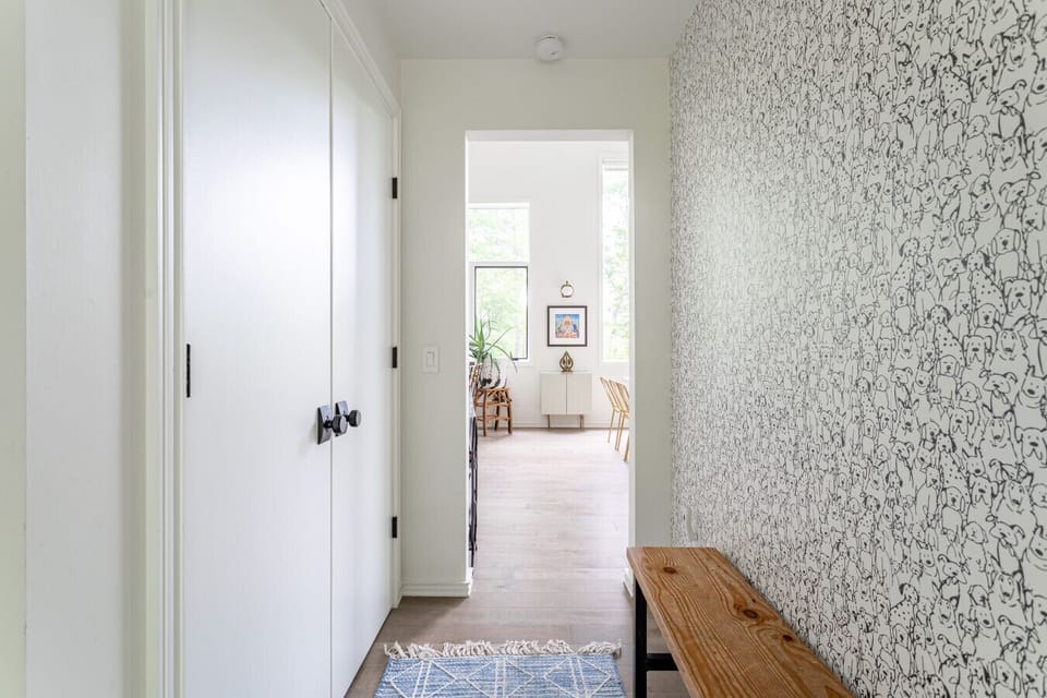 Bright entryway with creative wallpaper