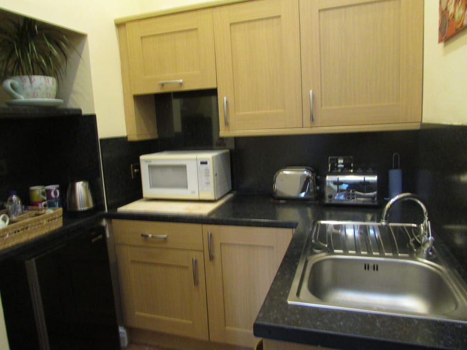 Family Suite, 2 Bedrooms | Private kitchenette | Coffee/tea maker, electric kettle
