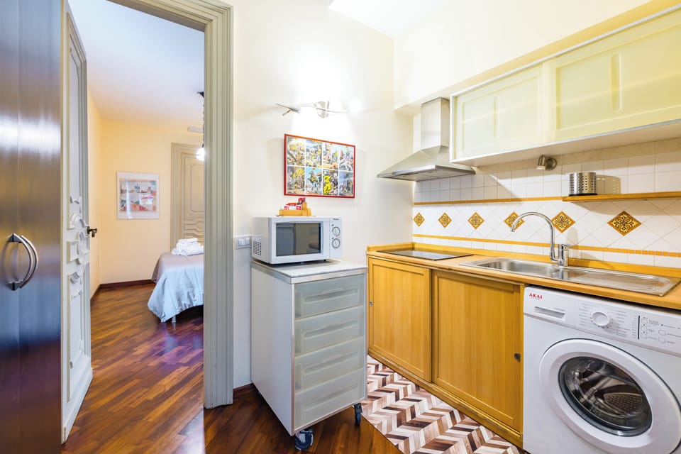Apartment (1 Bedroom) | Private kitchen | Stovetop, espresso maker, electric kettle, cookware/dishes/utensils