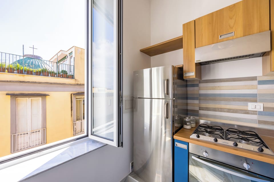 Apartment (1 Bedroom) | Private kitchen | Oven, stovetop, electric kettle, cookware/dishes/utensils