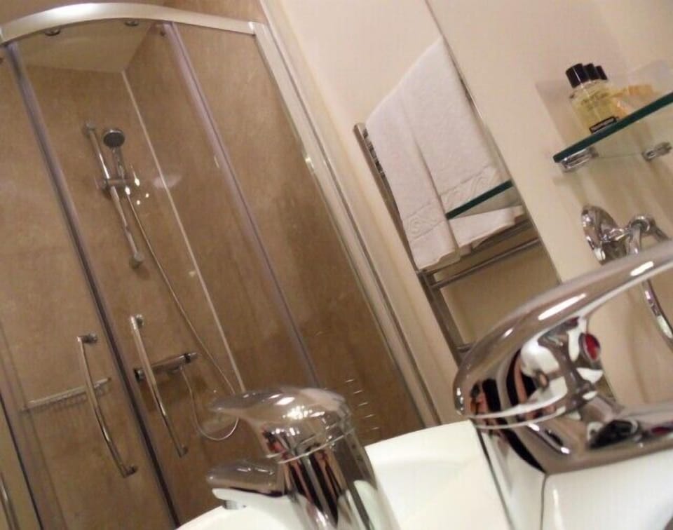 Shower, free toiletries, hair dryer, towels
