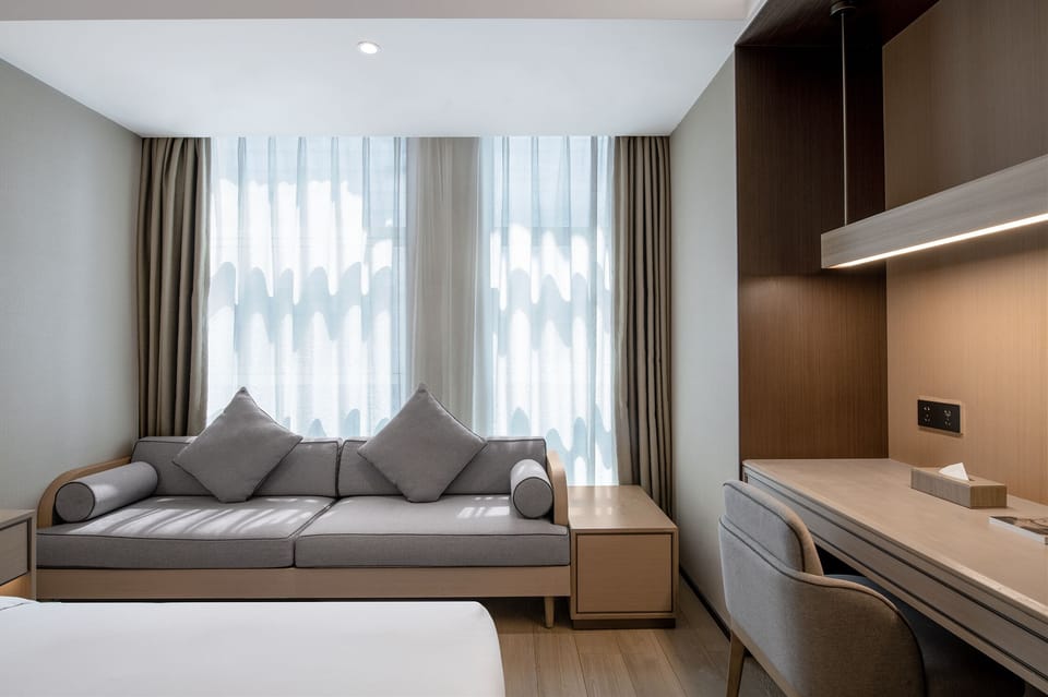 Basic Double Room, 1 Queen Bed, Air conditioning, City View | In-room safe, desk, laptop workspace, blackout drapes