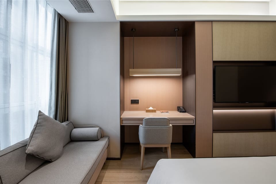 Basic Double Room, 1 Queen Bed, Air conditioning, City View | In-room safe, desk, laptop workspace, blackout drapes