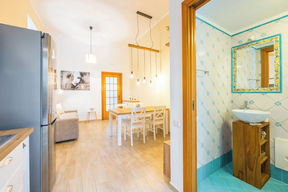 Apartment (2 Bedrooms) | Living area | 32-inch Smart TV with cable channels