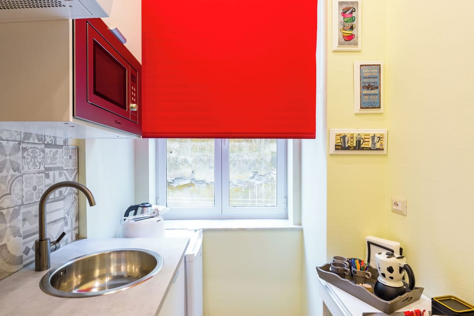 Apartment (1 Bedroom) | Private kitchen | Microwave, stovetop, electric kettle, cookware/dishes/utensils