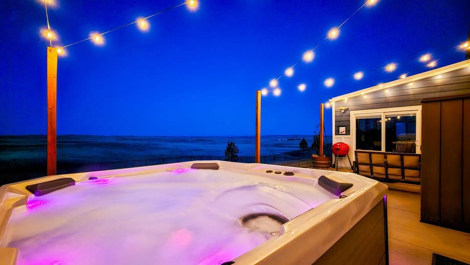 Discover an exceptional lifestyle with this unique home offering a harmonious blend of indoor comfort and exquisite outdoor amenities, including multiple well-appointed patios and a large hot tub.
