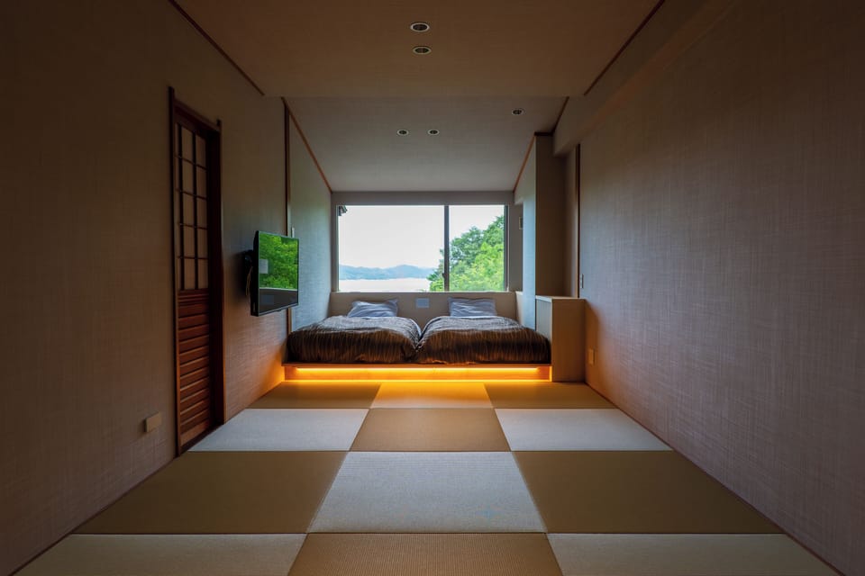 Executive Quadruple Room, 1 Bedroom, Private Bathroom, Ocean View (With open-air bath, Wi-Fi) | Premium bedding, in-room safe, free WiFi, bed sheets