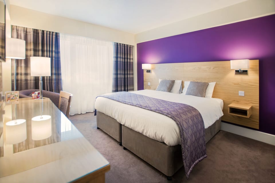 Desk, laptop workspace, blackout drapes, soundproofing