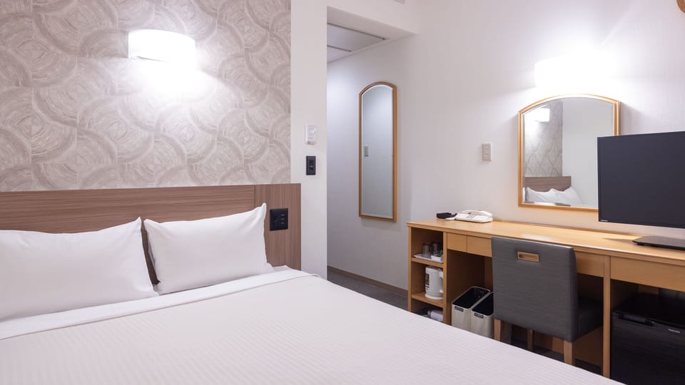 Desk, iron/ironing board (on request), WiFi (free), bed sheets