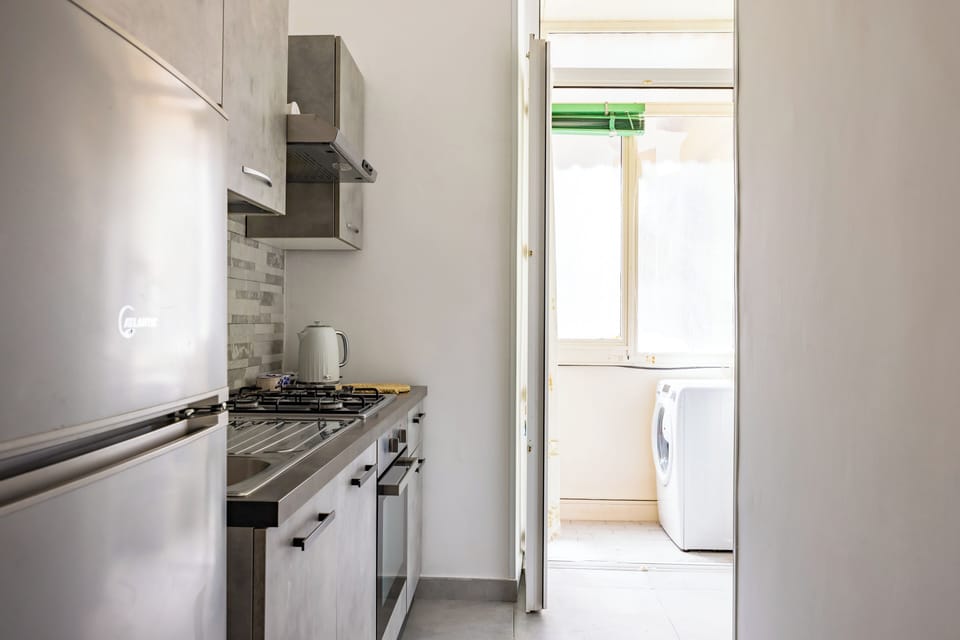 Apartment (2 Bedrooms) | Private kitchen | Oven, stovetop, electric kettle, cookware/dishes/utensils